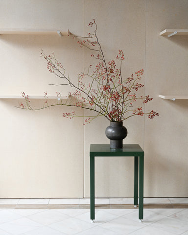 rose hip branches bunch alissa coe studio ceramic vase fresh flowers
